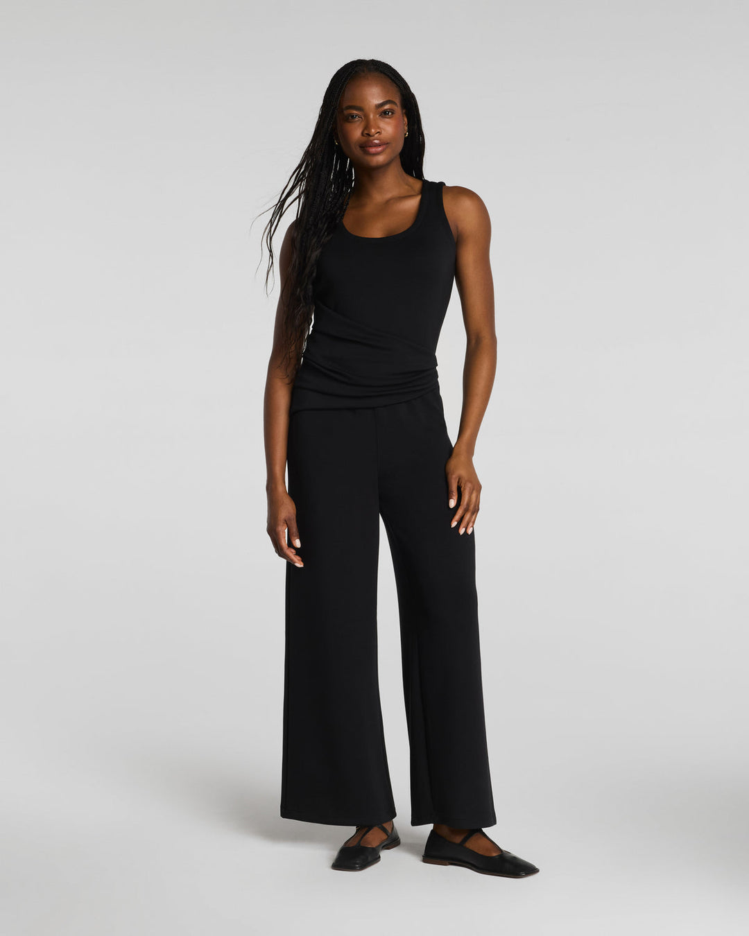 DRAPED SLEEVELESS JUMPSUIT