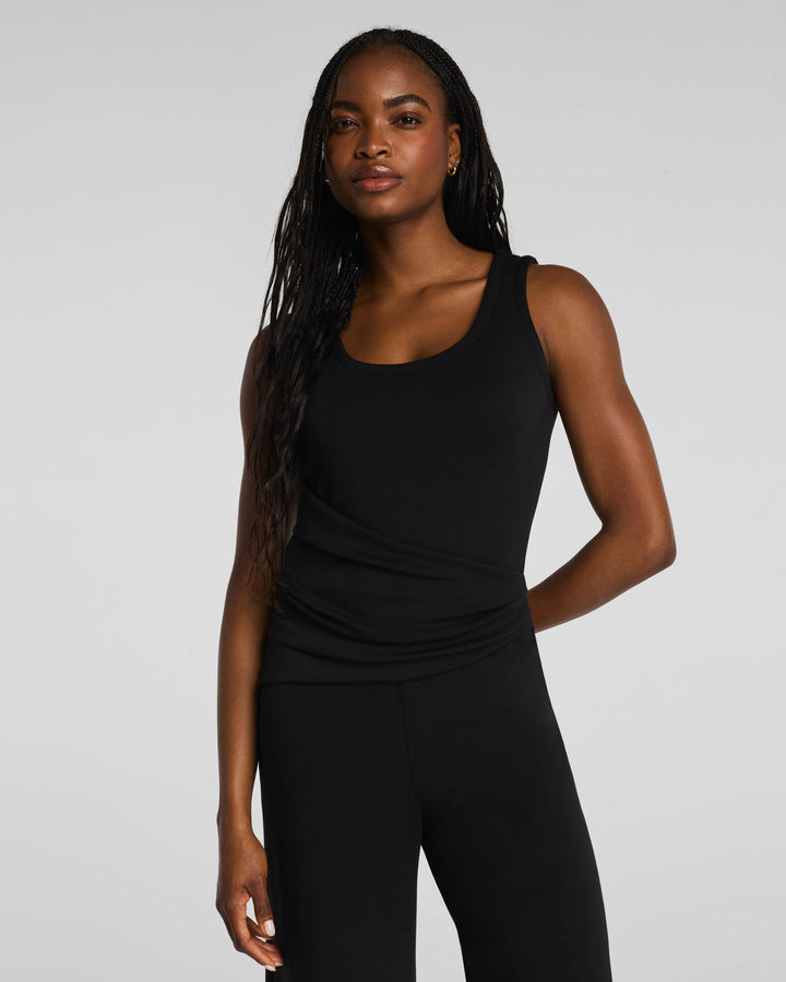 DRAPED SLEEVELESS JUMPSUIT