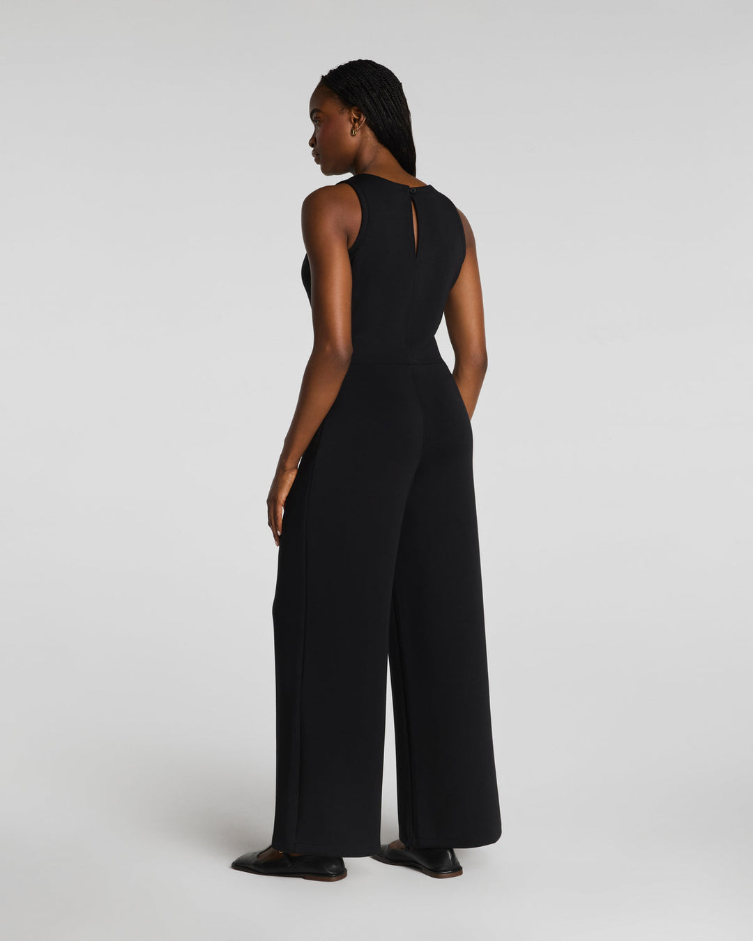 DRAPED SLEEVELESS JUMPSUIT