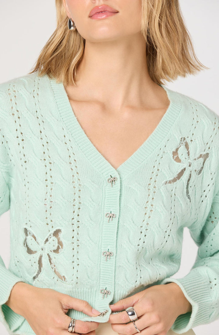 KALEN POINTELLE BOW CARDIGAN