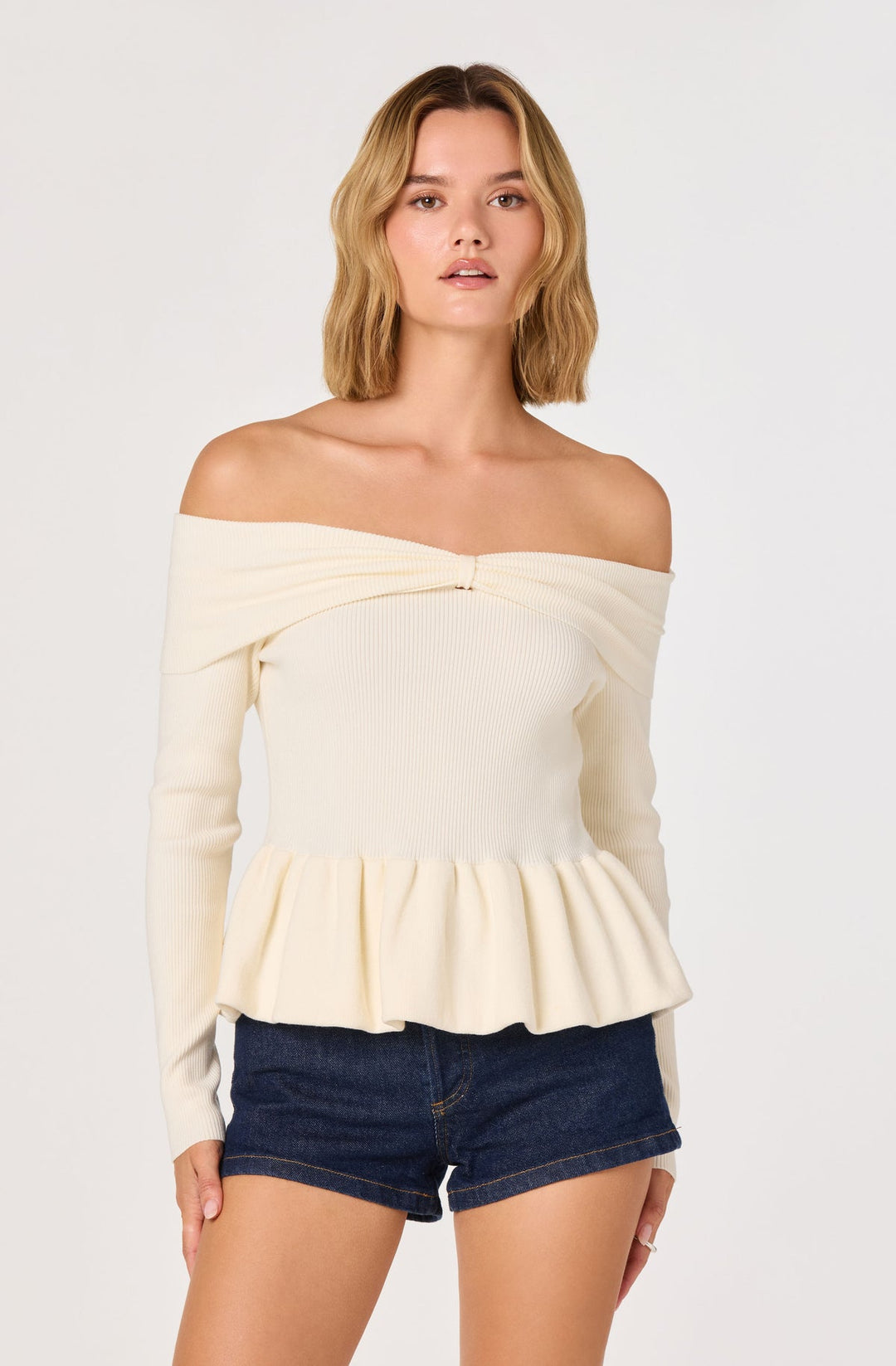 TIARRA PEPLUM SWEATER