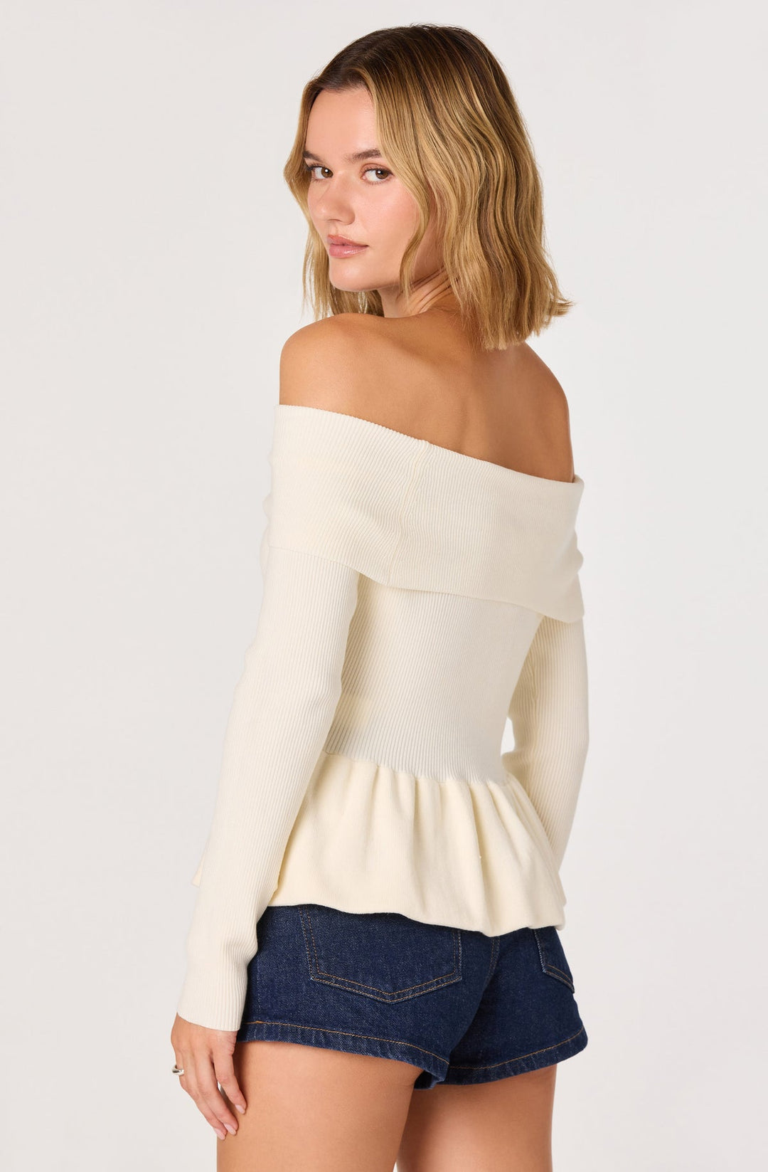 TIARRA PEPLUM SWEATER